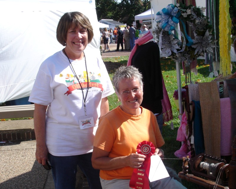 Second Place: Susan Tolbert, craft of spinning yarns into scarves, Conover, NC Second Place: Susan Tolbert, craft of spinning yarns into scarves, Conover, NC